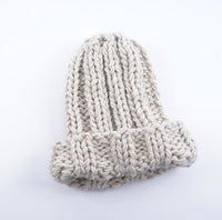 Europe and the United States new knit hat ladies autumn and winter fashion wild thick wool hat solid color simple earmuffs